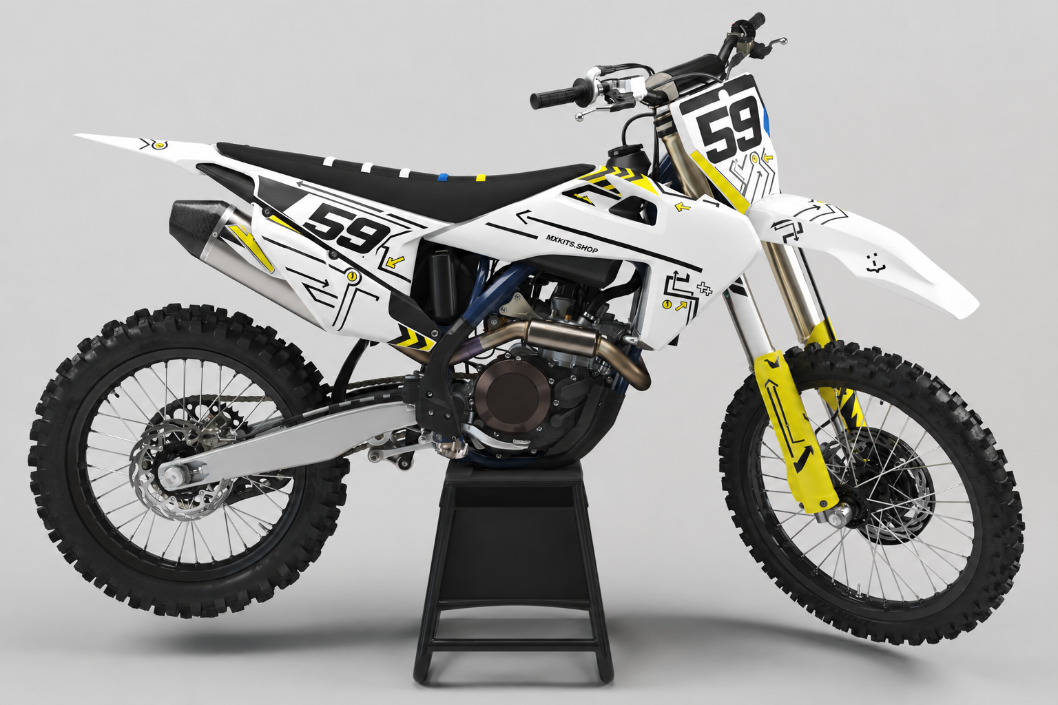 White black and yellow Husqvarna MX graphics kit with number 59 on a plain black bike stand