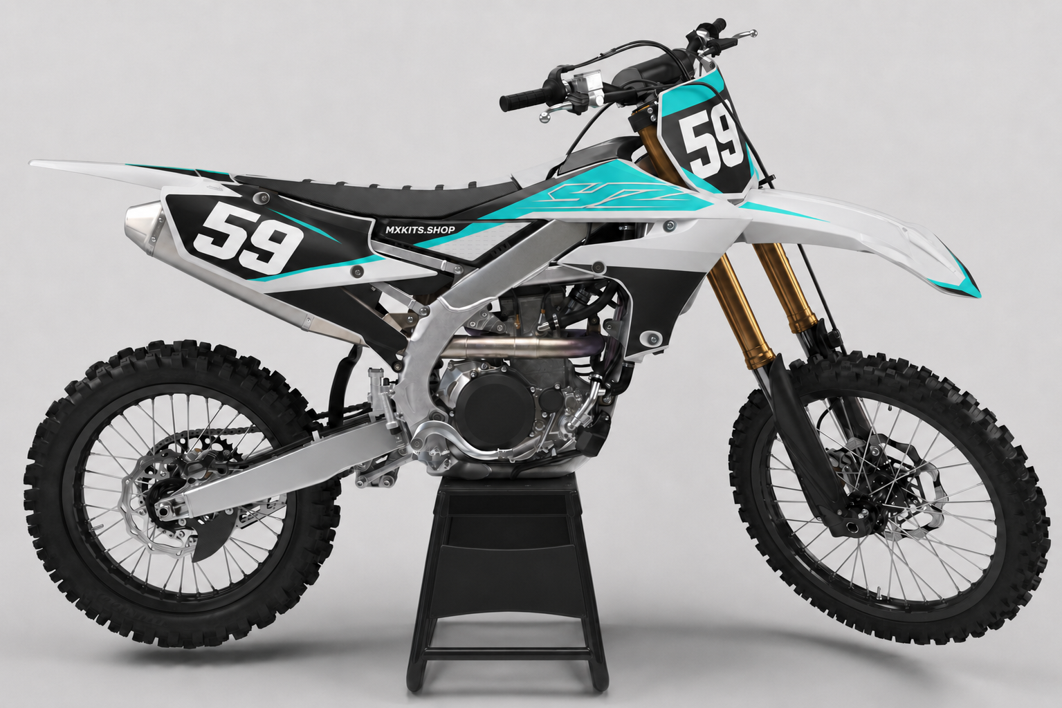 Silver and turquoise Yamaha custom decal kit displayed on a motocross bike with number 59 and MXKITS.SHOP branding