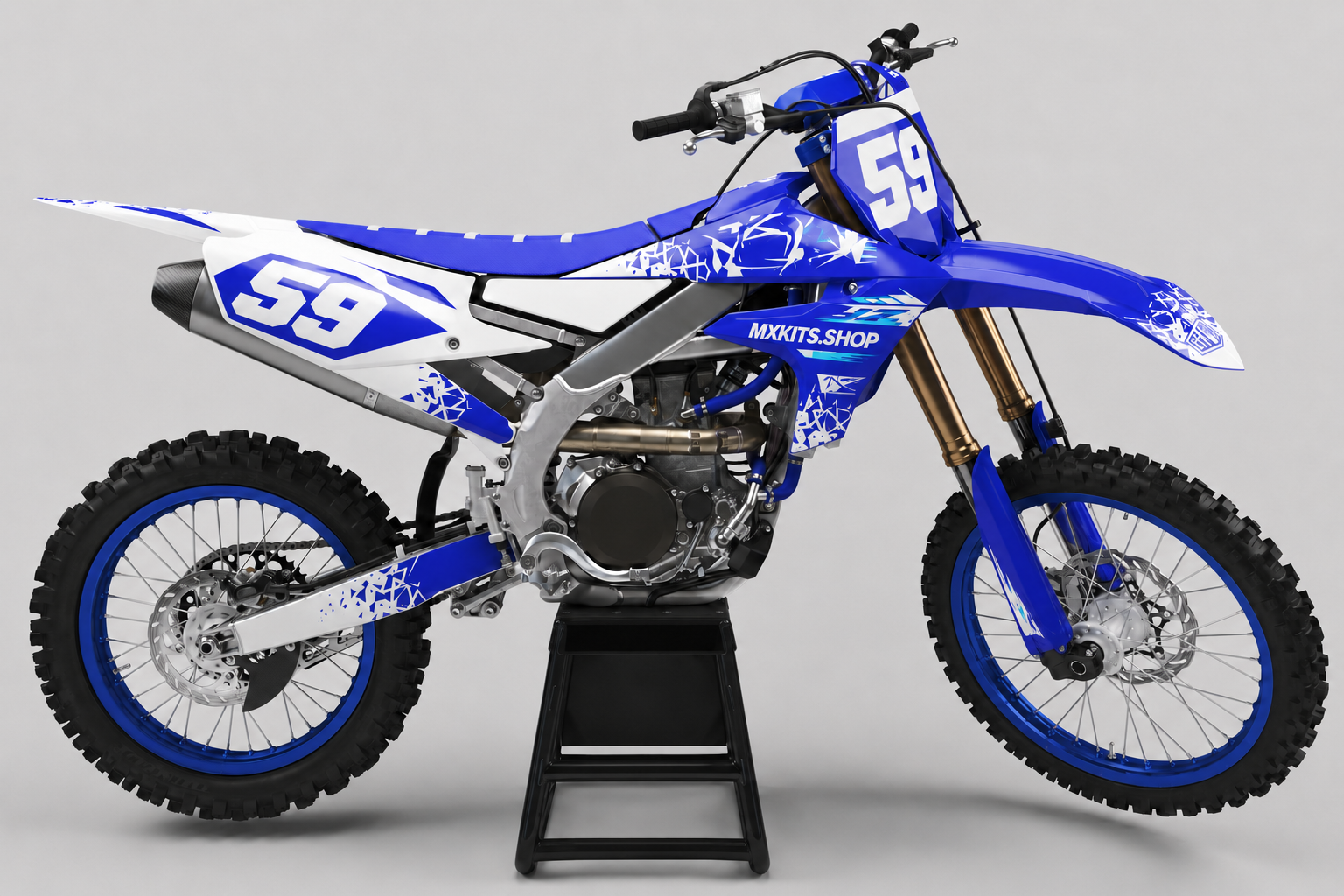 Blue and white fractured-pattern Yamaha motocross graphics kit displayed on a side-view bike with number 59