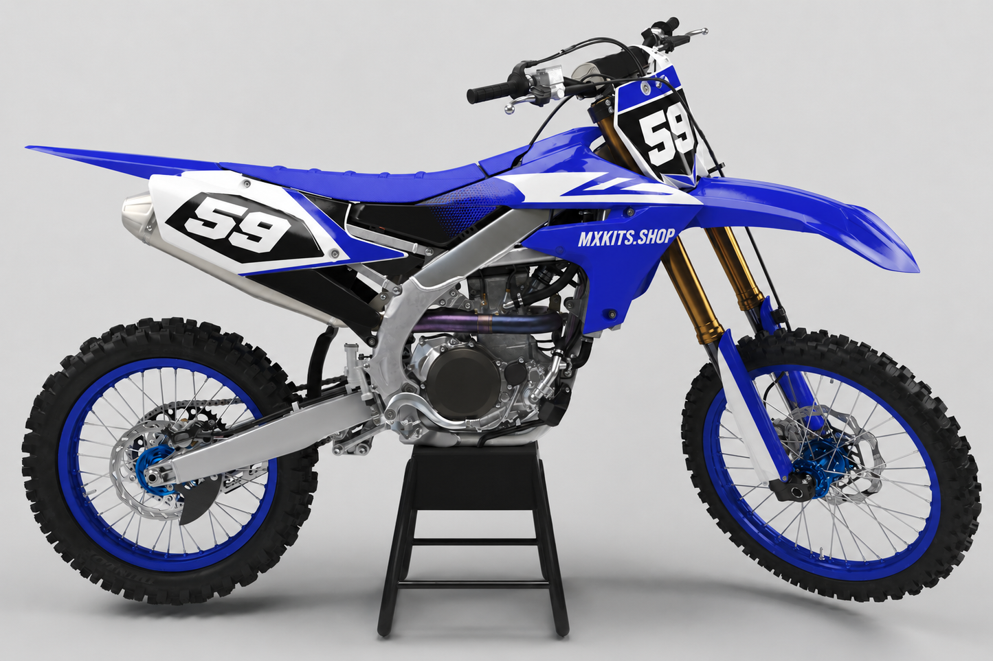 Sponsor-free blue white and black Yamaha motocross bike with Blue Horizon graphics, MXKITS.SHOP branding and race number 59