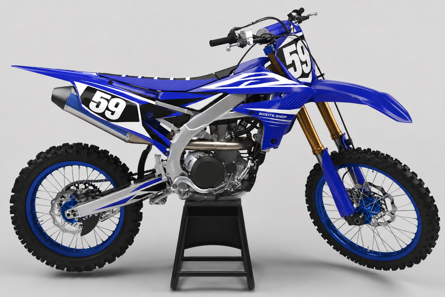 Deep blue, white and black Yamaha custom decal set fitted to a motocross bike with number 59 and MXKITS.SHOP side branding