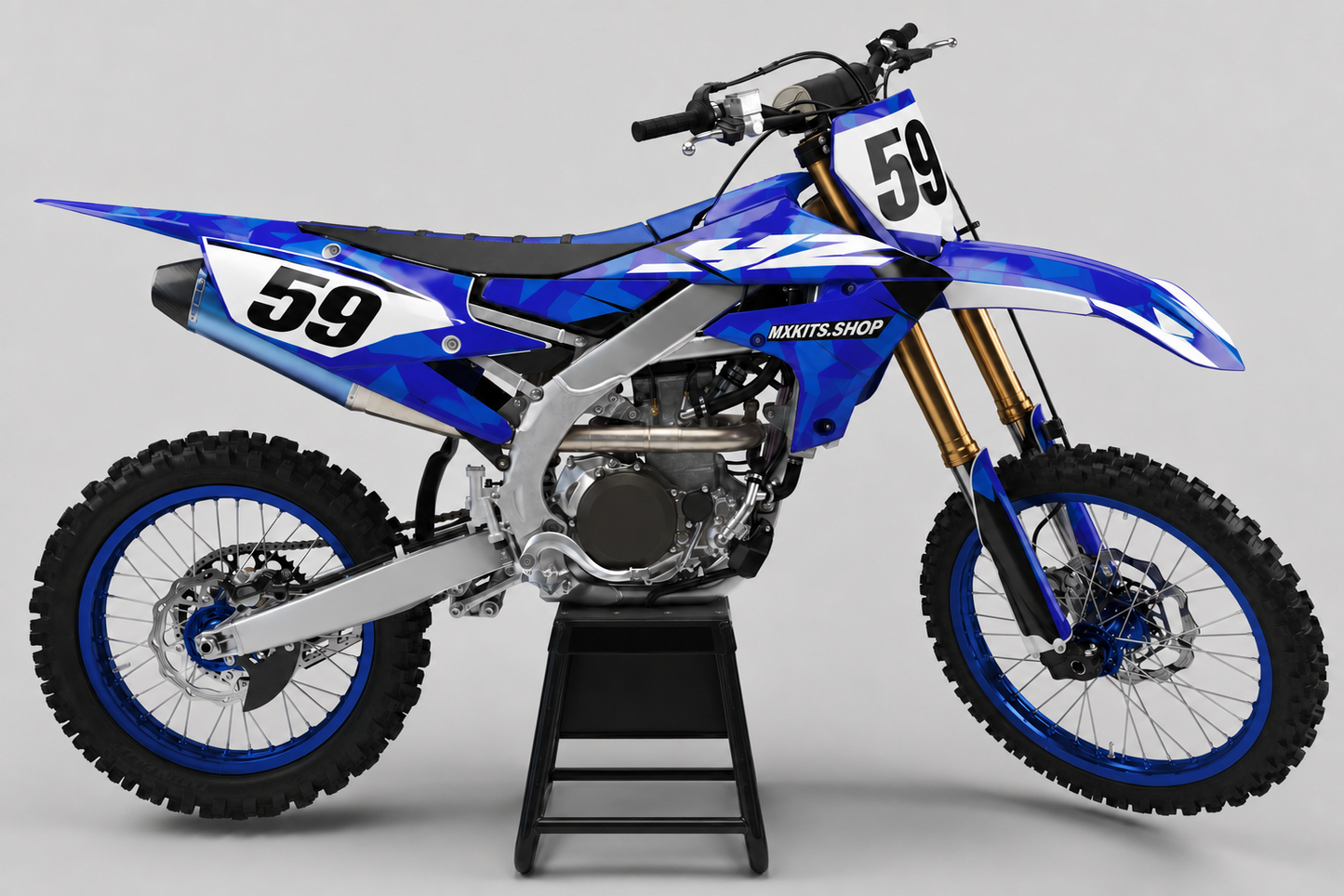 Sponsor-free blue violet white and black Yamaha motocross bike with Cobalt Facet graphics, MXKITS.SHOP branding and race number 59