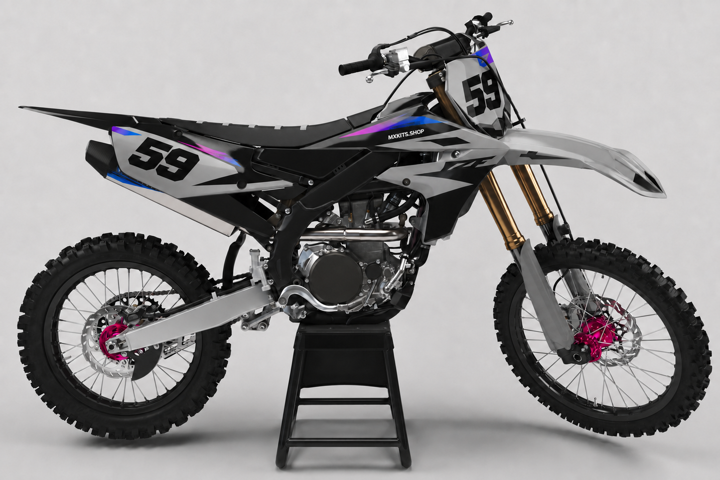 Graphite grey Yamaha motocross bike with subtle purple and blue accents, magenta hubs and race number 59