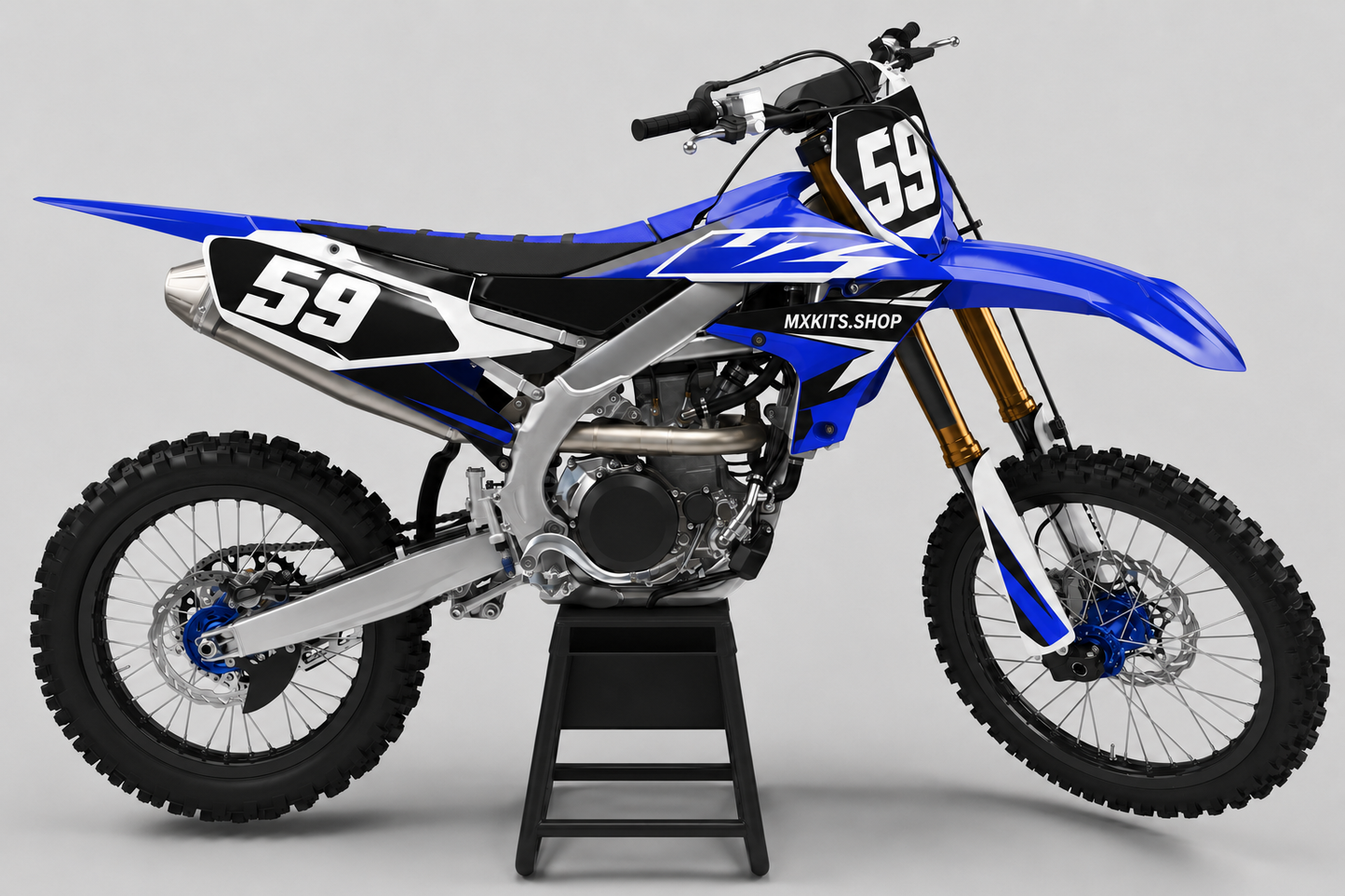 Sponsor-free royal blue, black and white Yamaha motocross bike with Royal Vanguard graphics, MXKITS.SHOP branding and race number 59