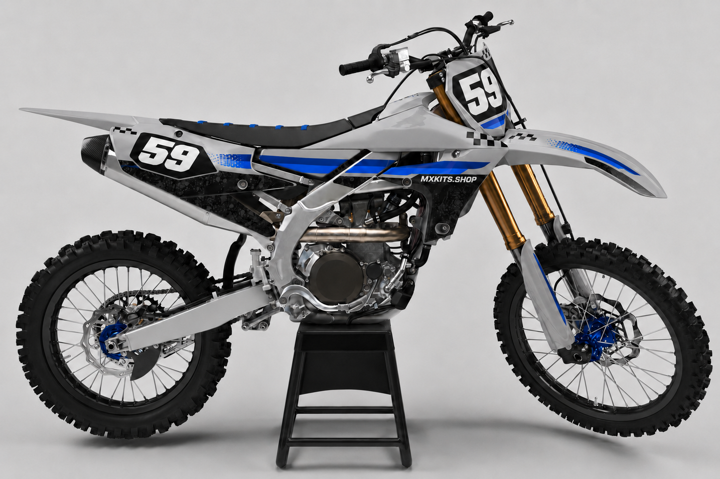 Sponsor-free silver gray black and blue Yamaha motocross bike with Silver Apex graphics, MXKITS.SHOP branding and race number 59