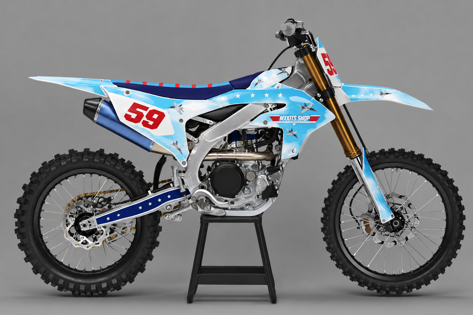 Sponsor-free sky blue white and navy Yamaha motocross bike with aircraft themed Sky Squadron graphics, MXKITS.SHOP branding and race number 59