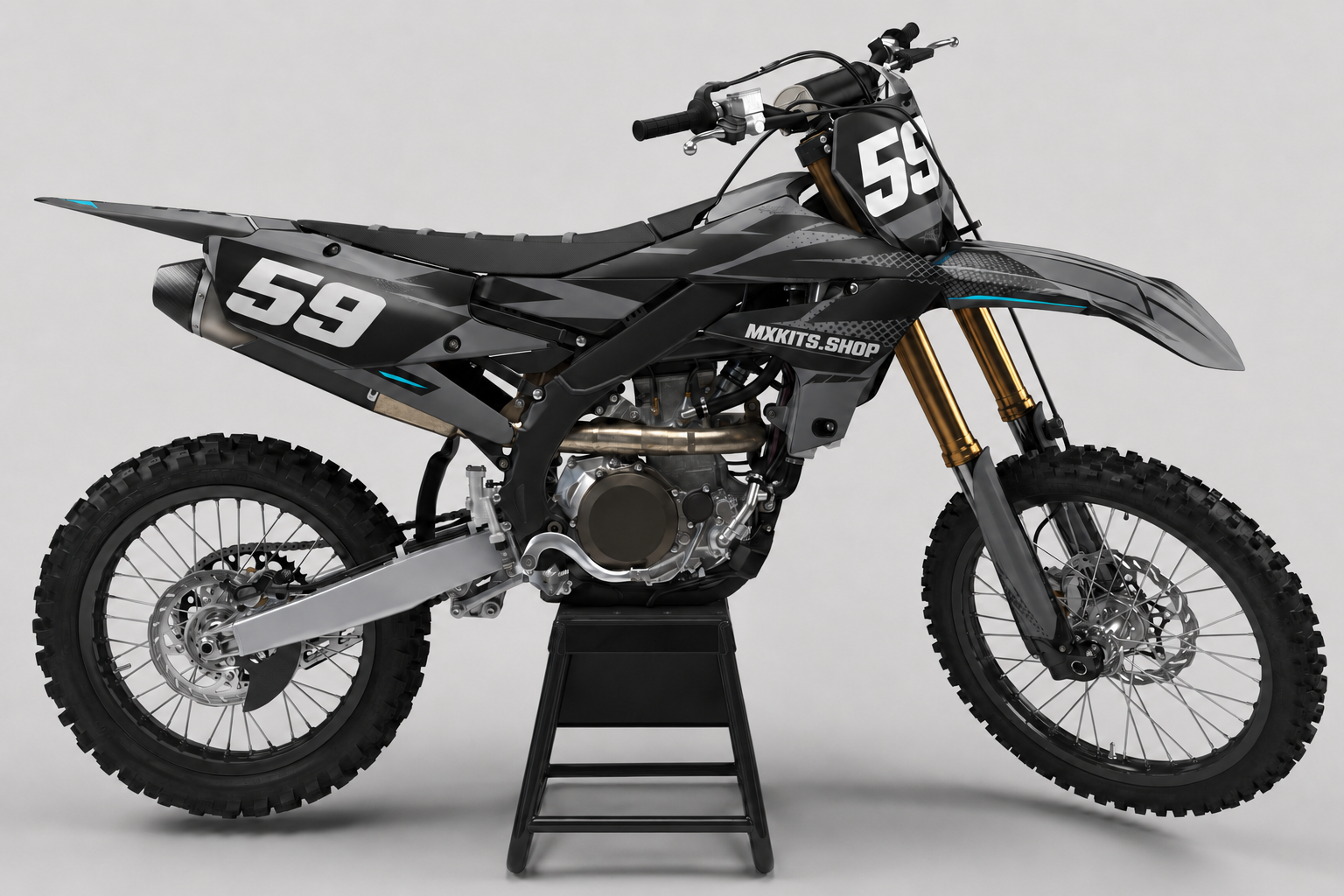 Sponsor-free charcoal gray Yamaha motocross bike with subtle cyan Stealth Matrix graphics, MXKITS.SHOP branding and race number 59